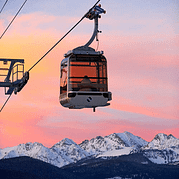 The Vail gondola in winter at sunset