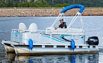 guy on a pontoon boat