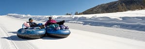 a couple snow tubing