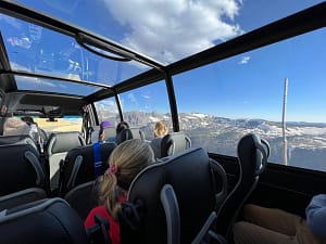 visitors on a Purple Points Tour Company van