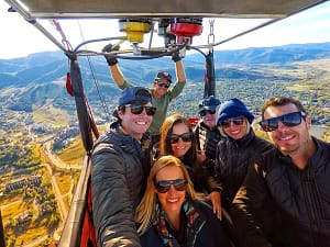 friends out for a flight in a hot air balloon ride in Steamboat Springs