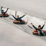 having fun snow tubing