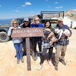 Tourists posing for a photo a imogene pass