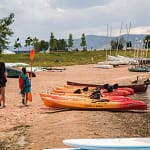 paddleboards and kayaks at the Boulder Reservoir marina