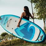 woman and paddleboard