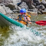 woman kayaking on a colorado river