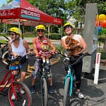 Group riding E-bikes in downtown Boulder