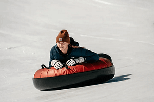 girl snow tubing
