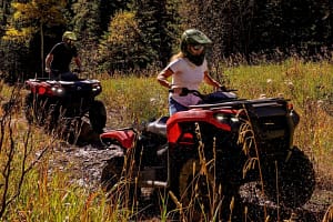 ATV single ride through a creek in Estes Park