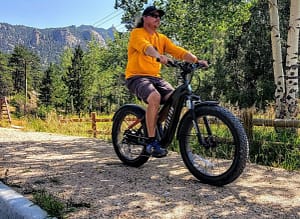 man on E bike at Lake Estes