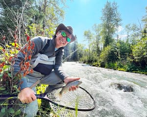 man fly fishing in telluride