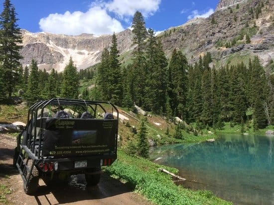 truck tour near an alpine lake